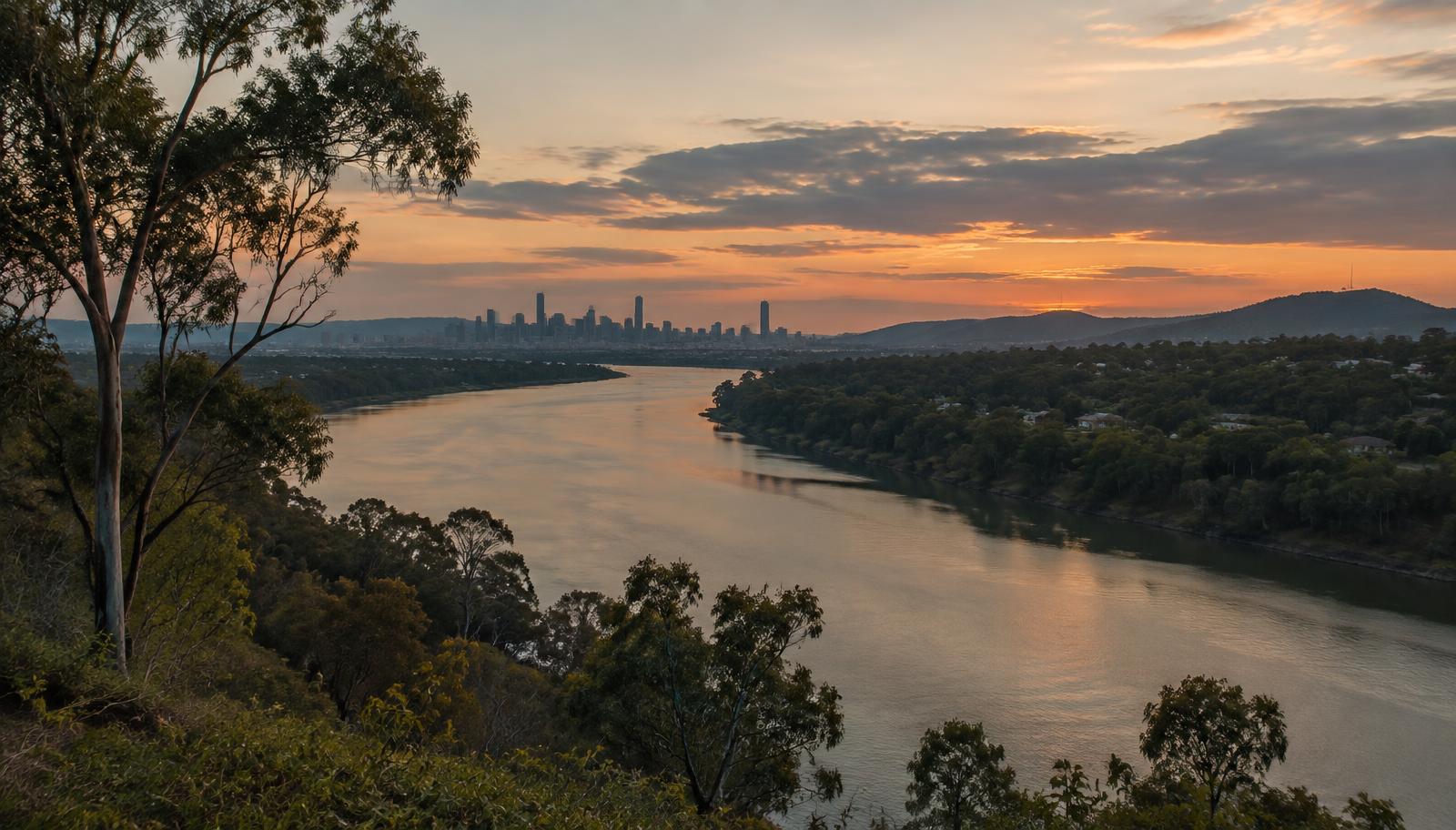 Brisbane River winding toward the city at dusk
